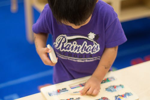 Child playing with a puzzle