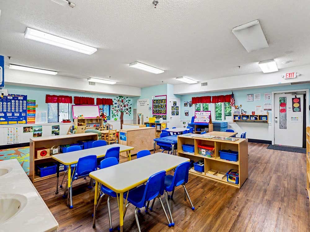 Classroom with child-sized tables and chairs
