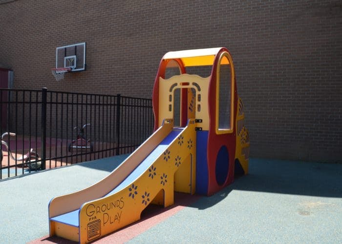 Colorful playground slide with a small play structure