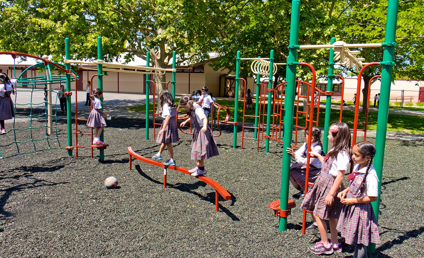 Children playing on playground equipment
