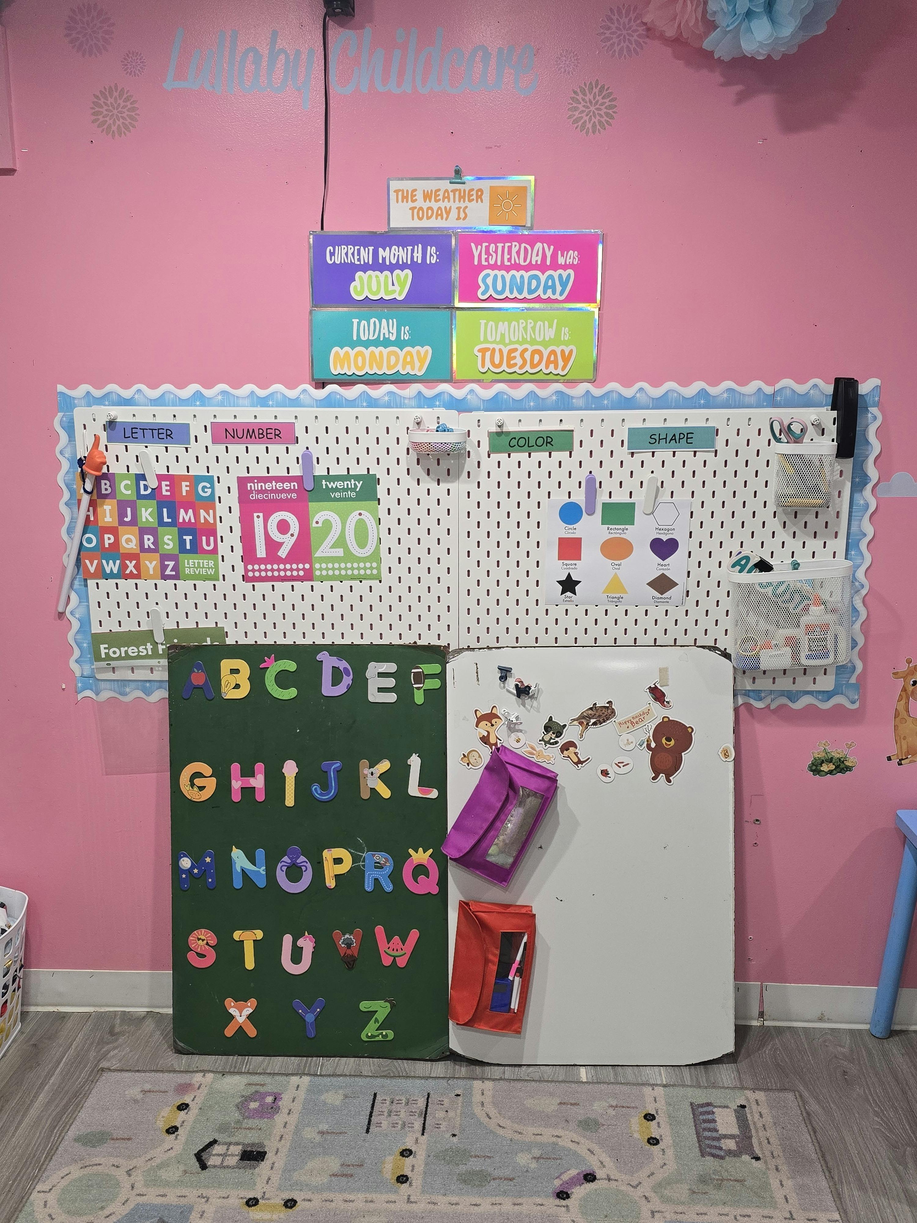 Children's learning area with alphabet board, calendar, and pegboard