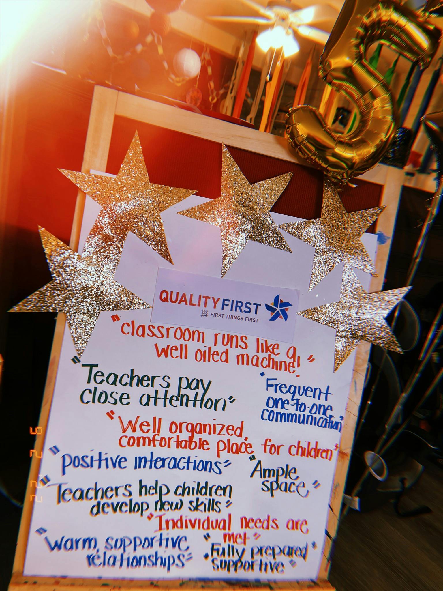 White board with "Quality First" logo and handwritten notes on teaching practices