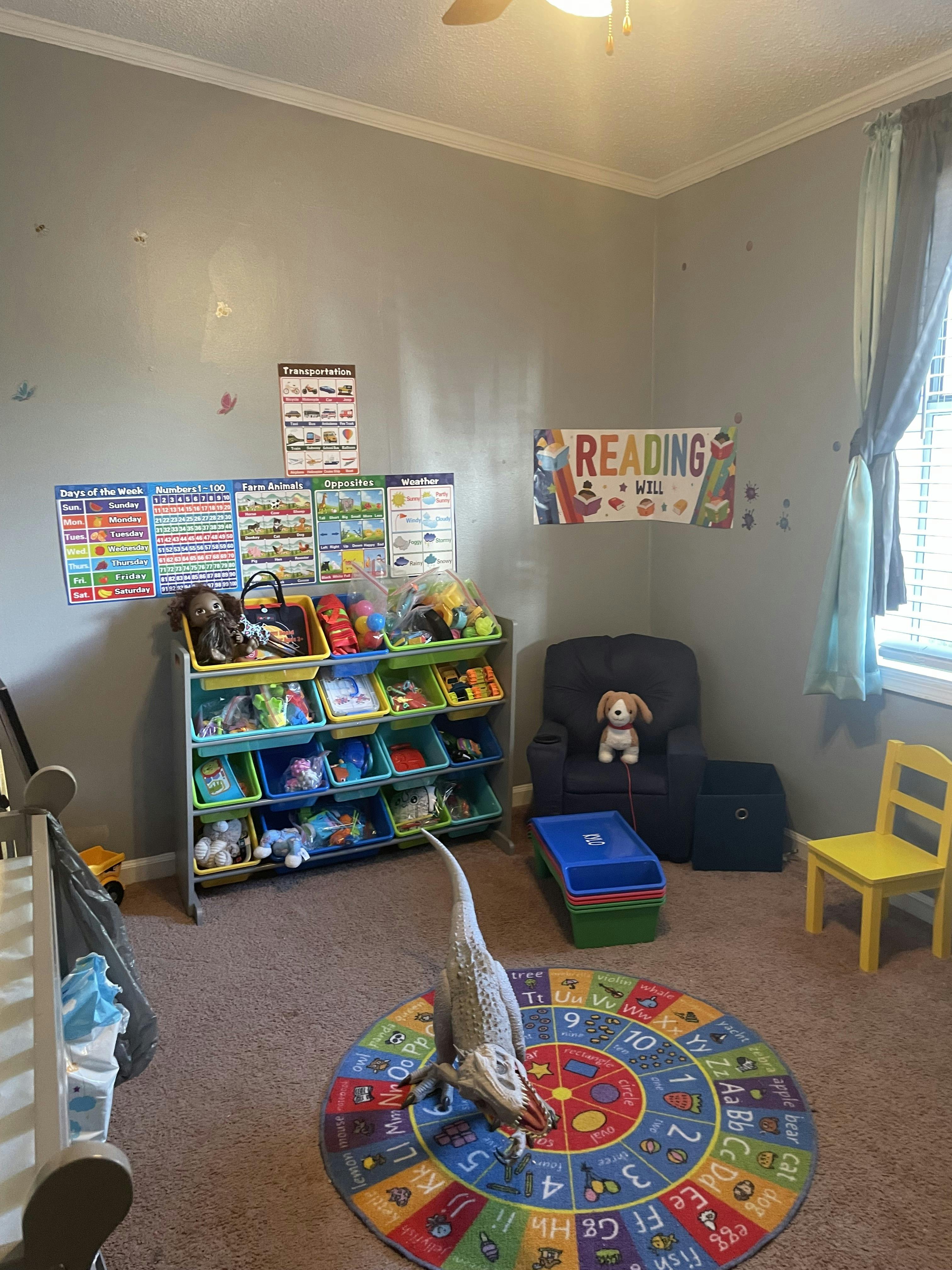 Children's room with toy organizer, reading banner, and dinosaur toy on a rug