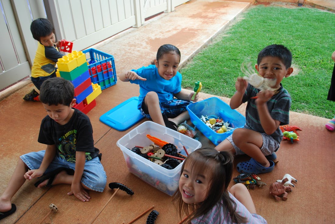 Children playing with toys outdoors