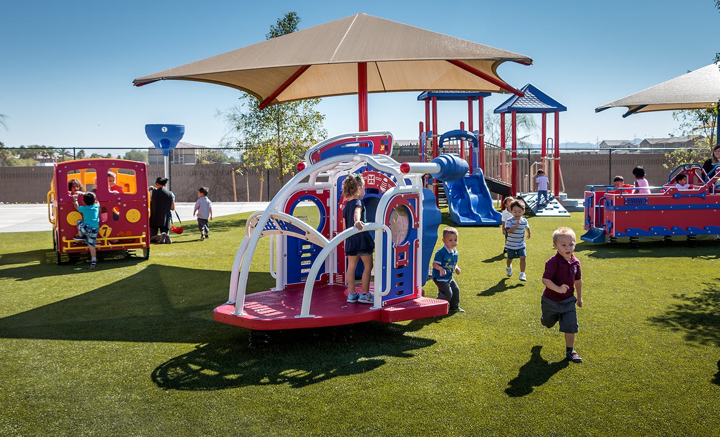 Children playing on playground equipment