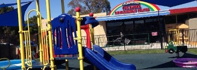 Playground with slides and climbing structures