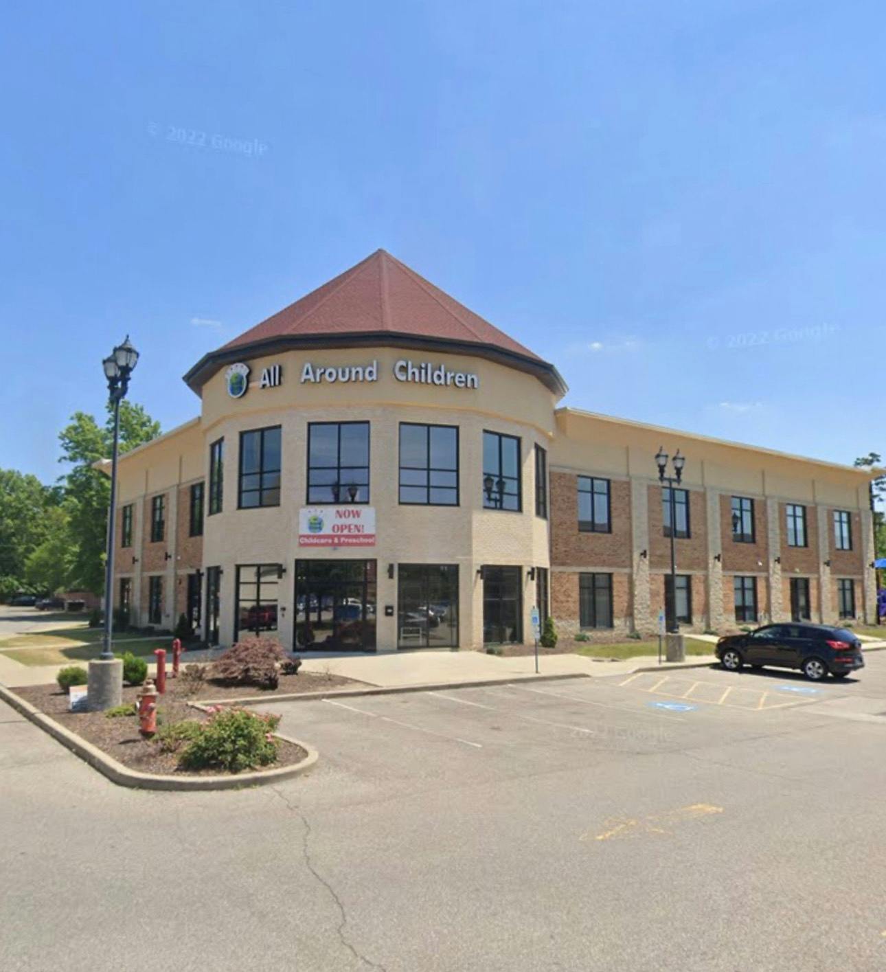 Building with "All Around Children" sign