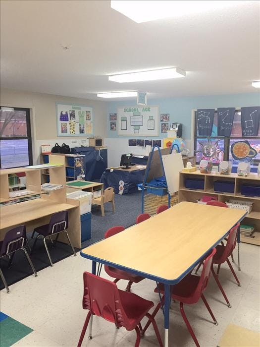 Classroom with child-sized tables and chairs