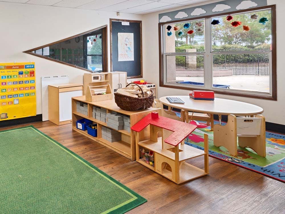Classroom with child-sized furniture and learning materials