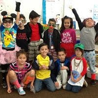 Group of children in costumes posing