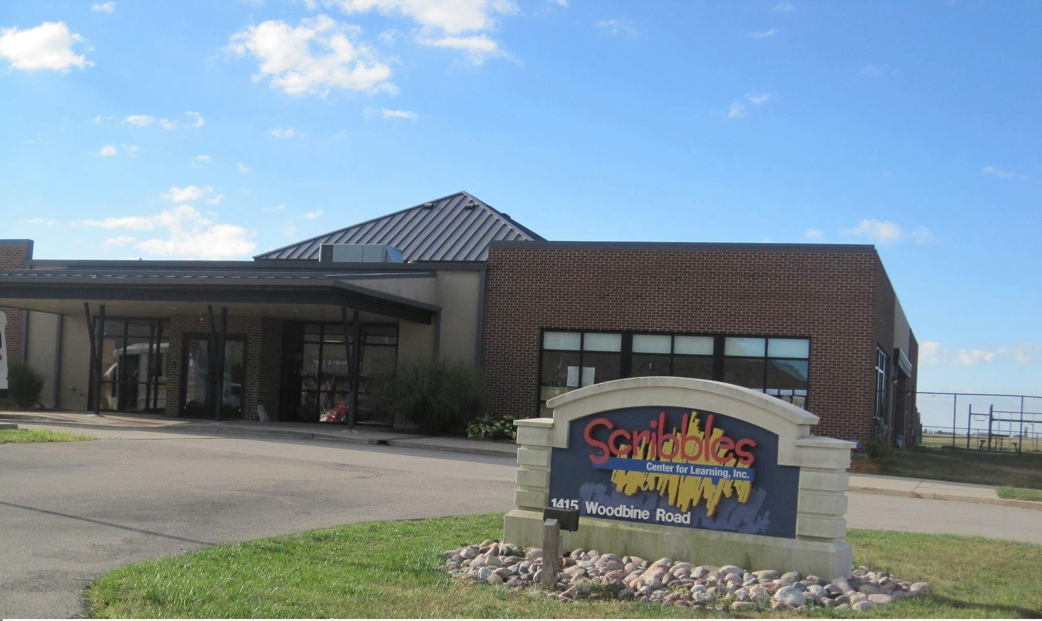 Building with a sign that reads "Scribbles"