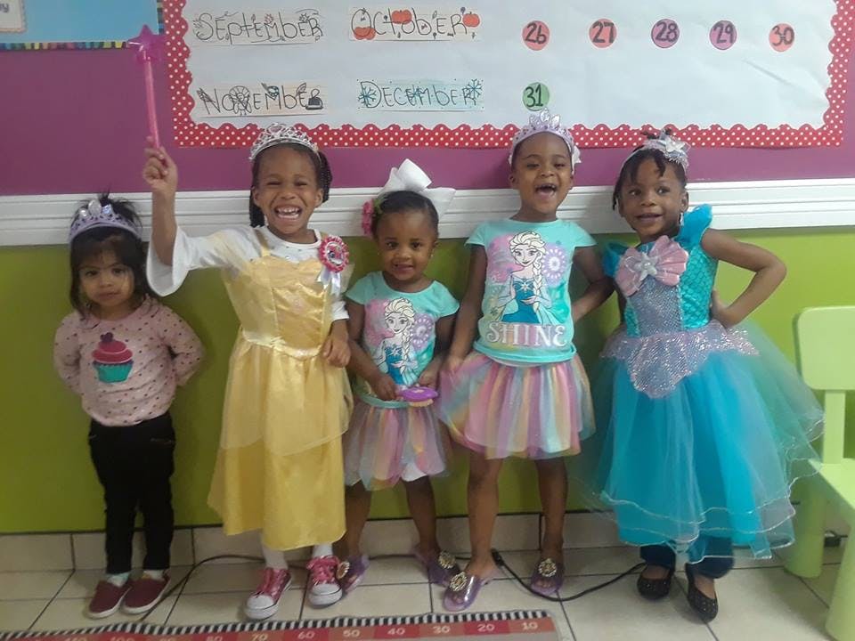 Five children in princess costumes