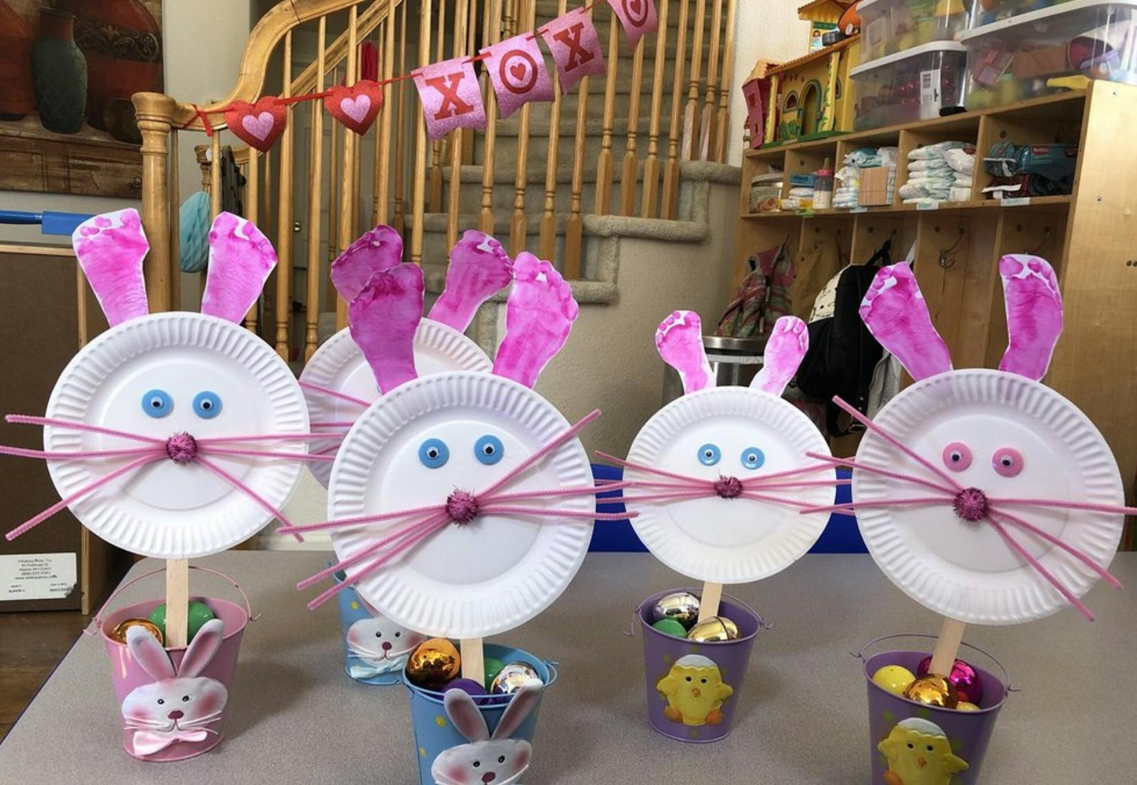 Paper plate bunny crafts with pink ears and whiskers