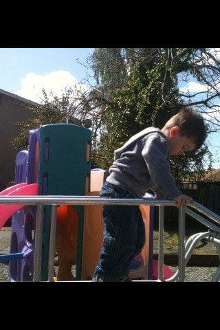 Child on a playground structure