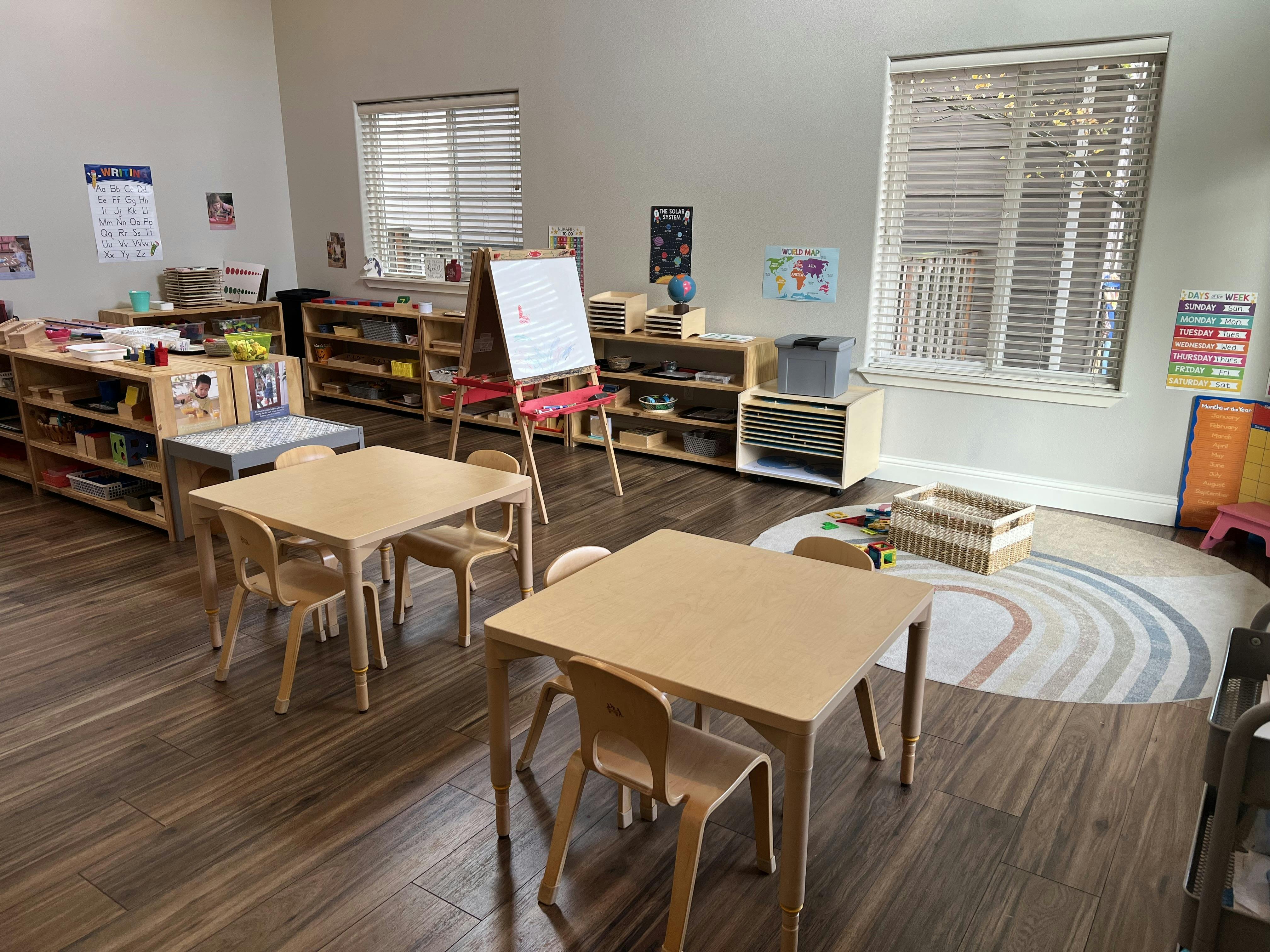 Classroom interior with small tables and chairs for children
