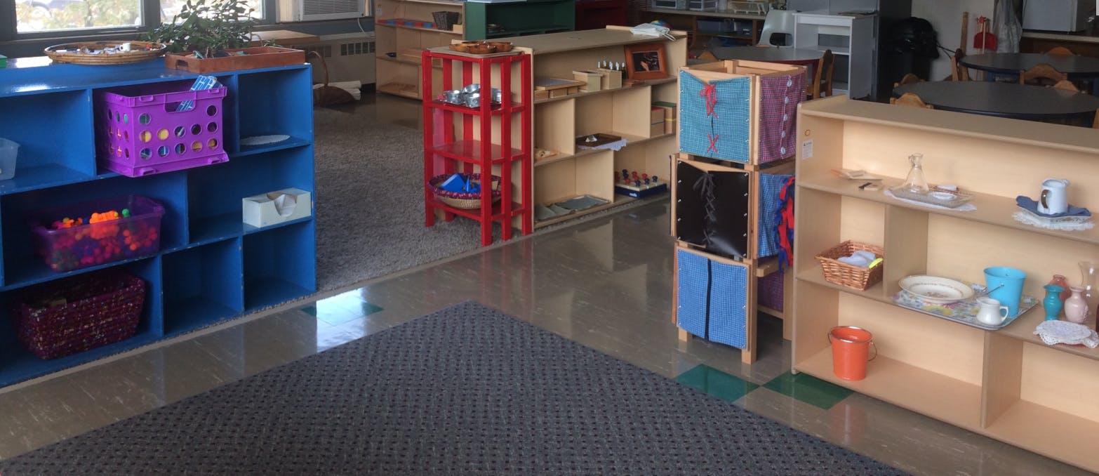 Classroom with shelves and storage bins