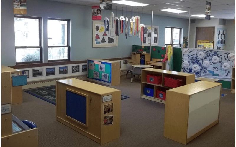 Empty classroom with windows and activity centers