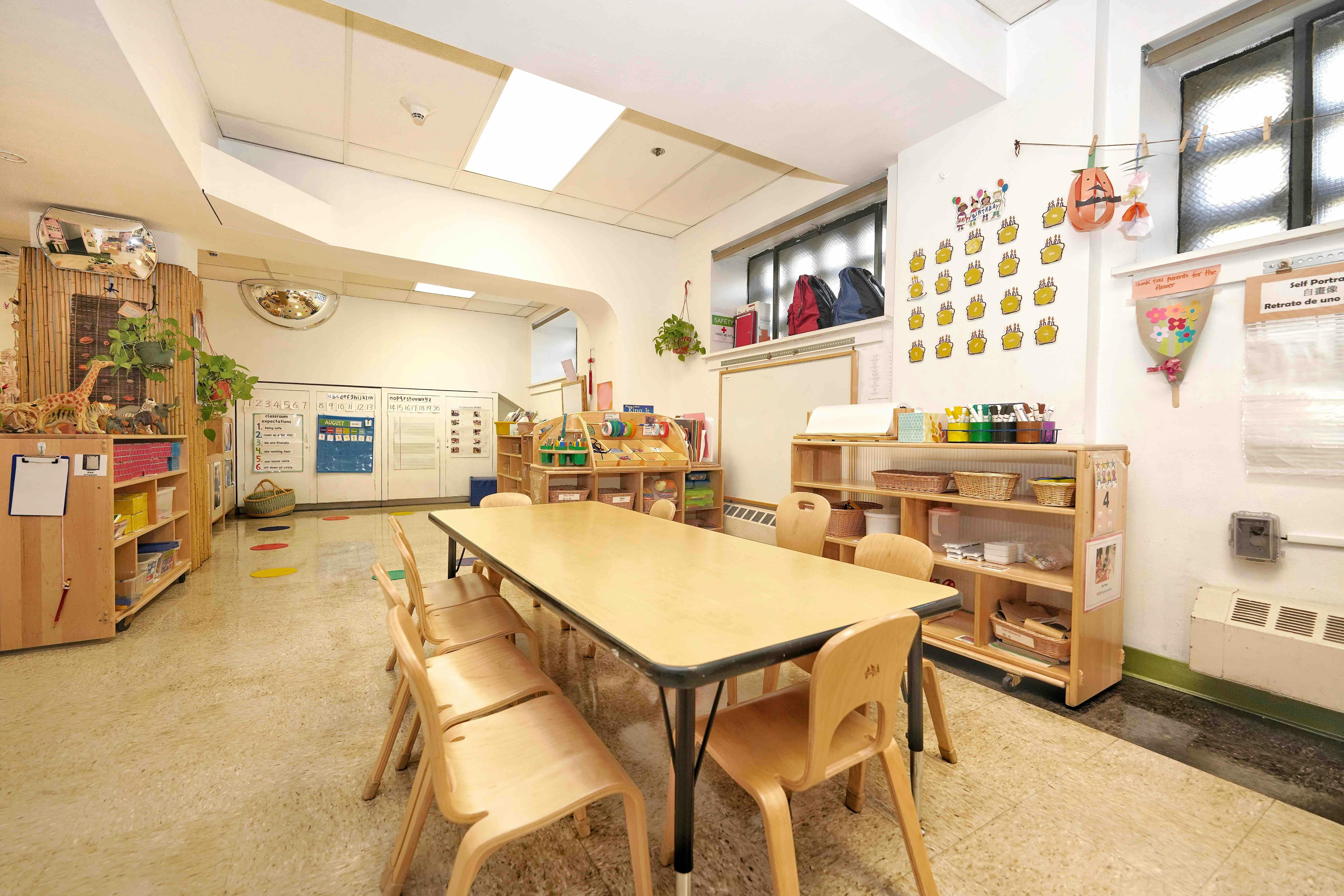 Empty classroom with chairs and a table