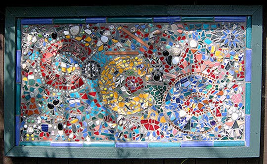 Colorful mosaic art in a rectangular frame