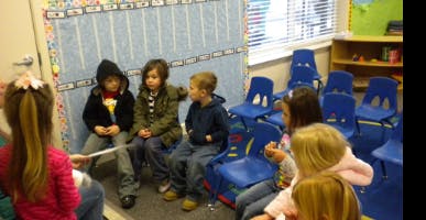 Children sitting in a classroom