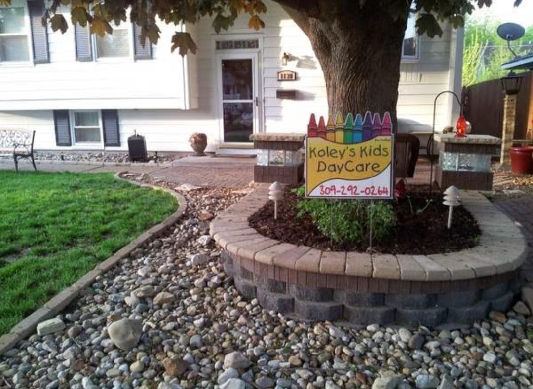 Daycare sign in front of a house