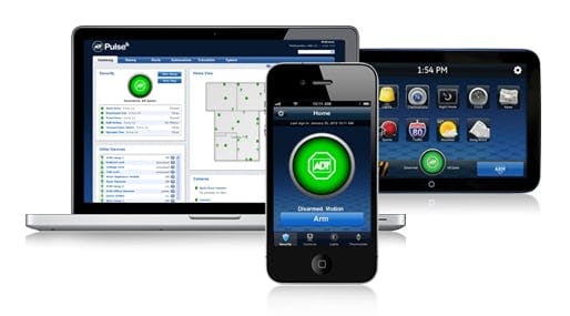 Laptop, smartphone, and tablet displaying security system interfaces