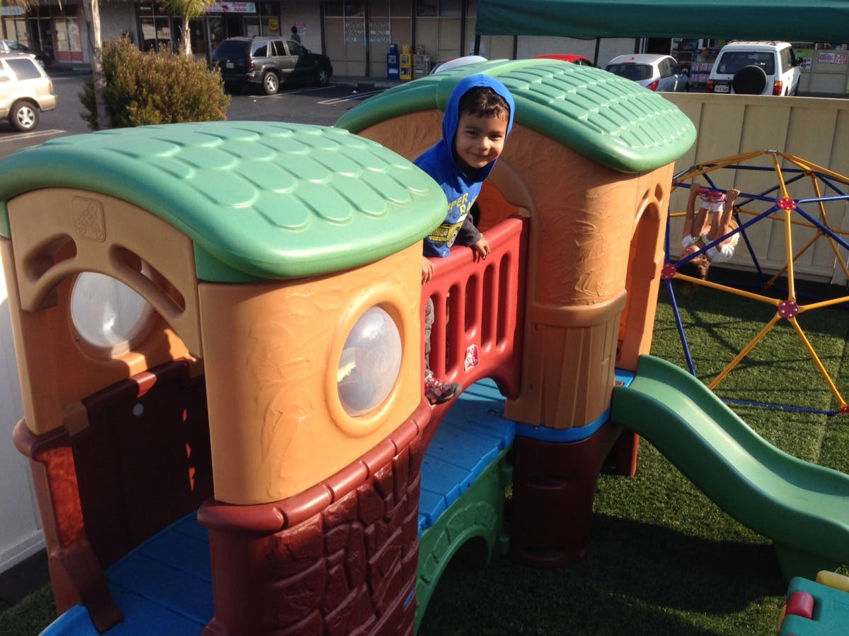 Child on a playground structure