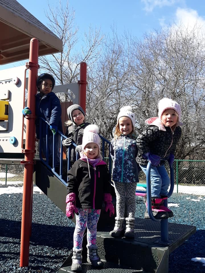 Children on a playground structure