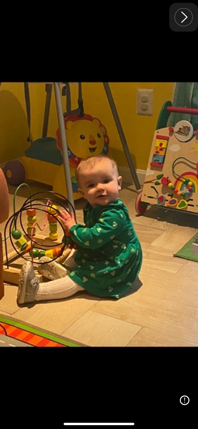 Child playing with a bead maze toy