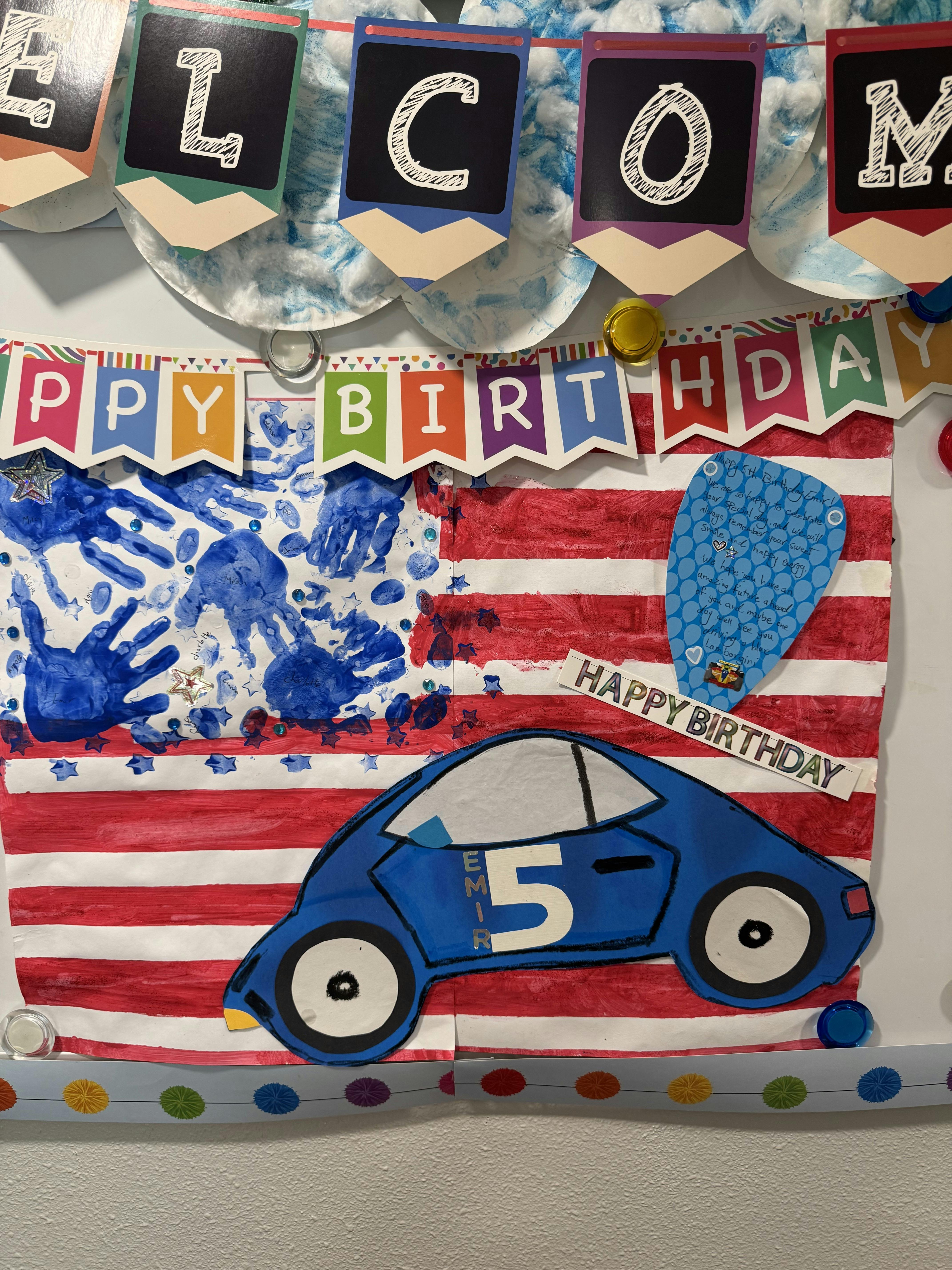 Birthday banner and craft project featuring an American flag and a blue car cutout