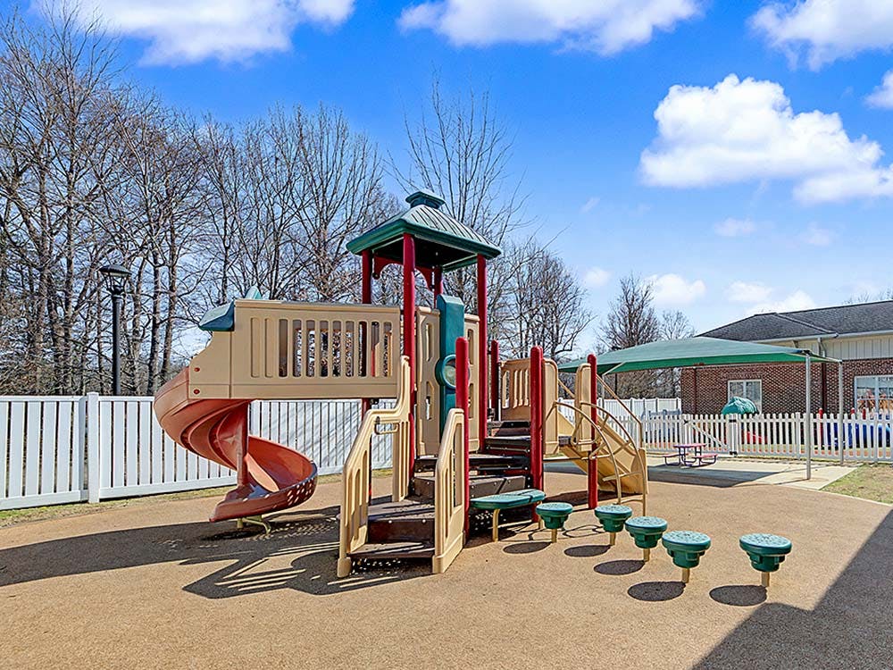 Playground with slides and climbing structures