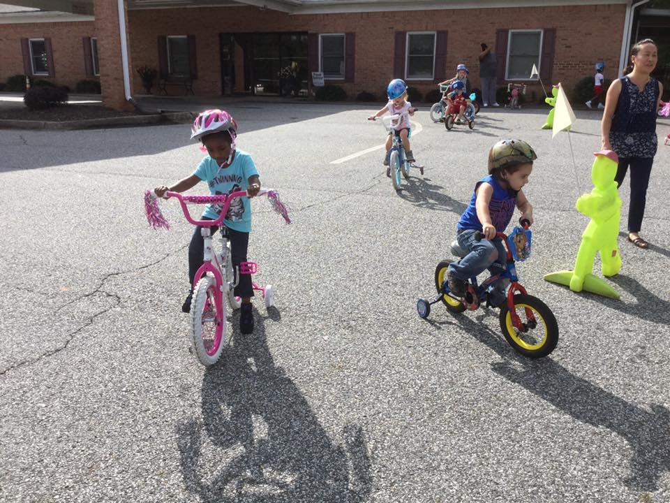 Children riding bicycles outdoors