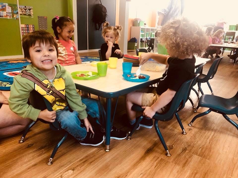 Children sitting at a table