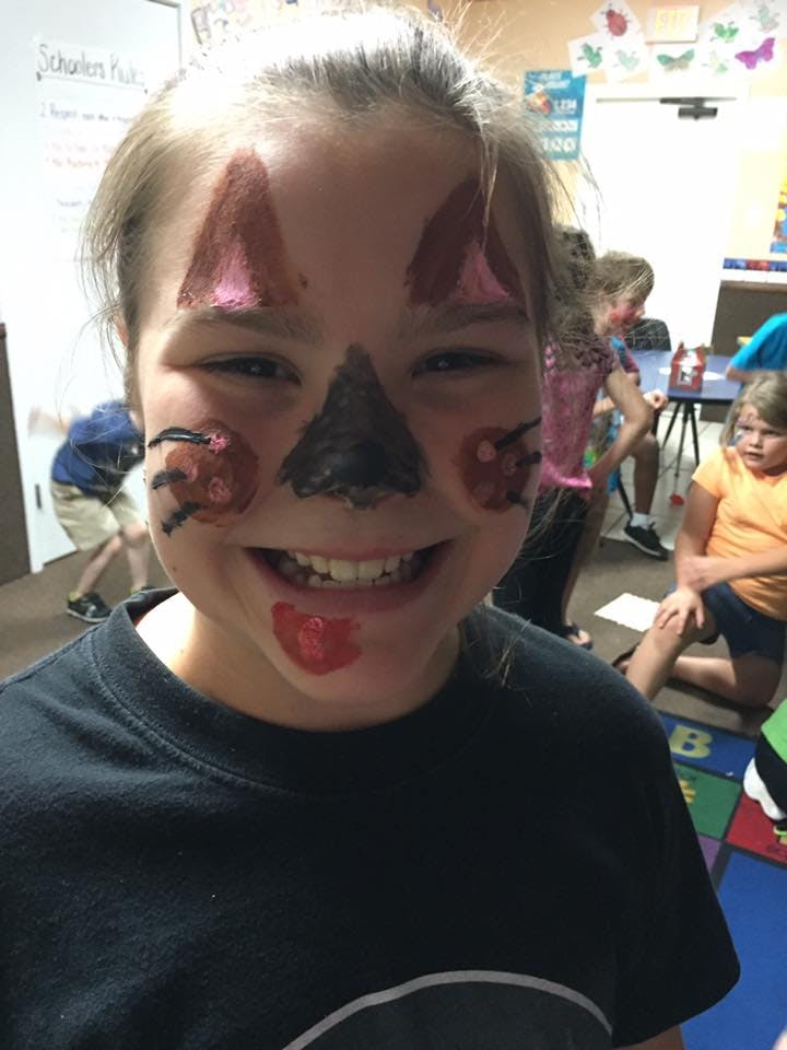 Child with face paint