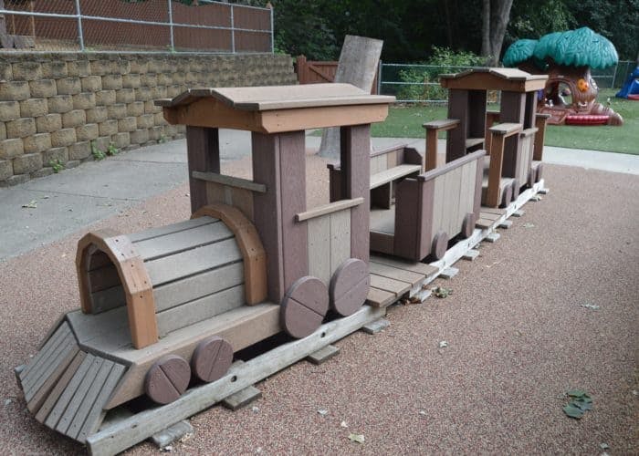 Wooden train playground structure