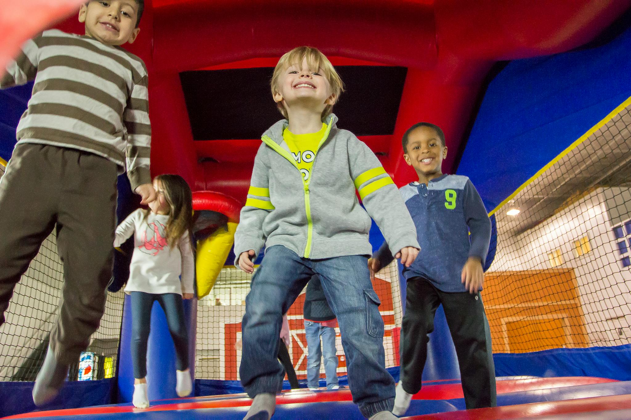 Children jumping in an inflatable bounce house