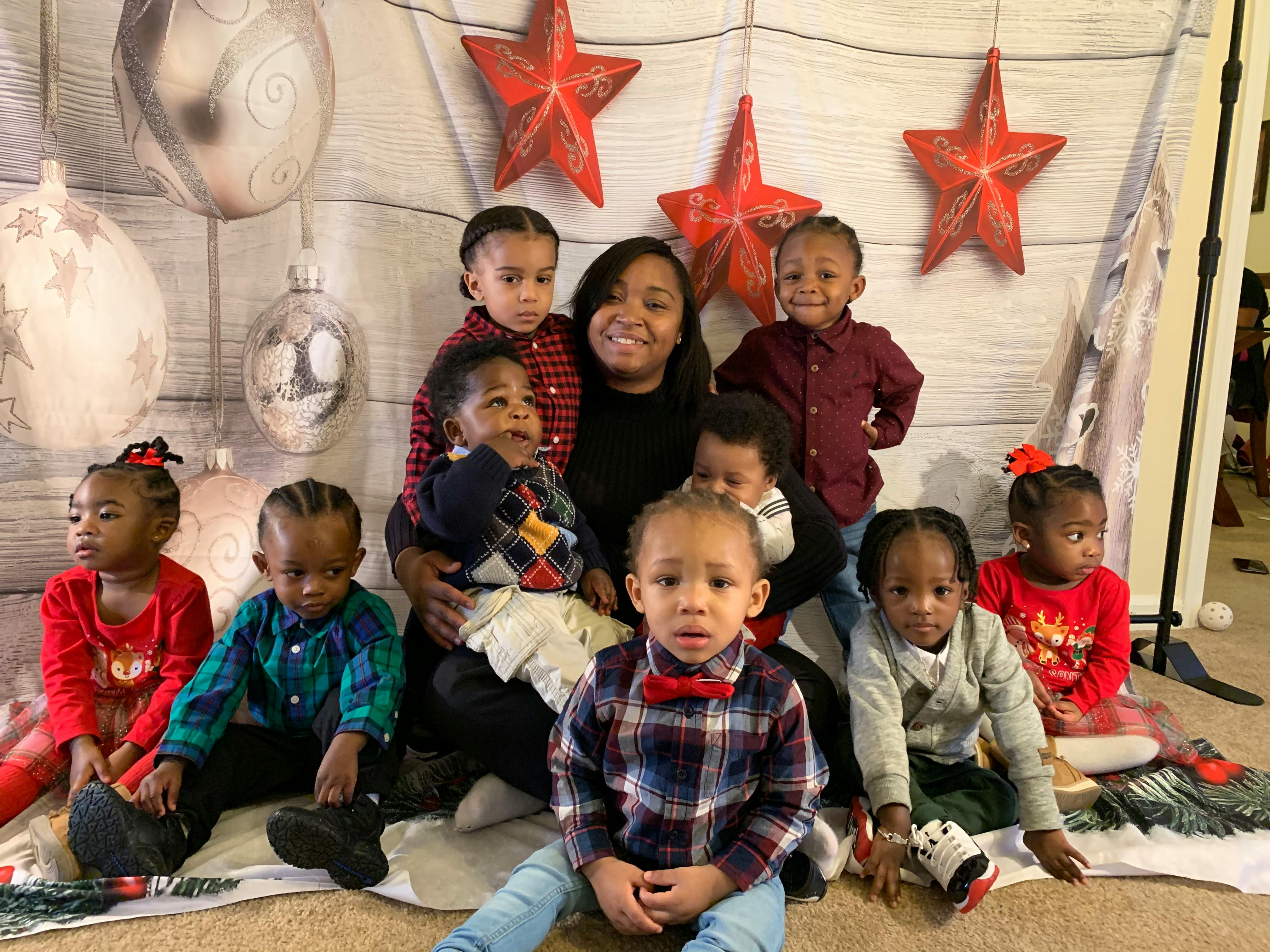 Person with multiple children and teens