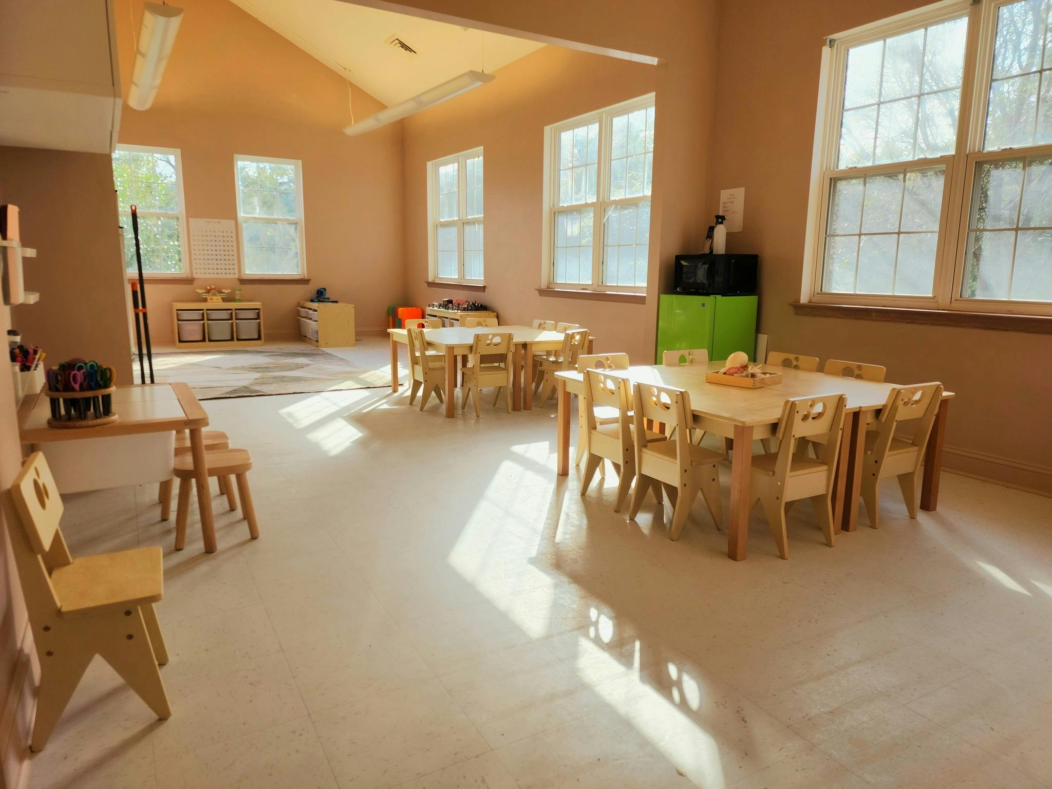 Classroom with small tables and chairs