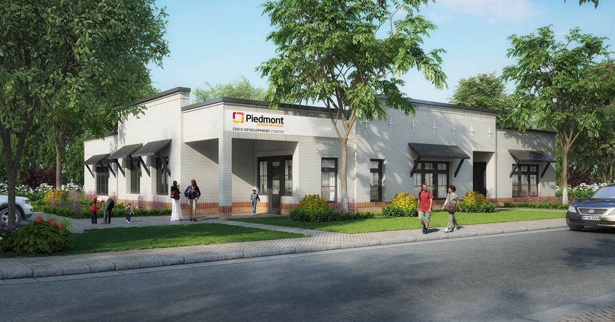 Building with "Piedmont" sign and people walking outside
