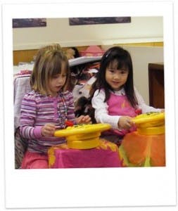 Two children playing with toys