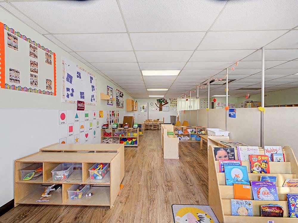 Classroom with shelves, toys, and books