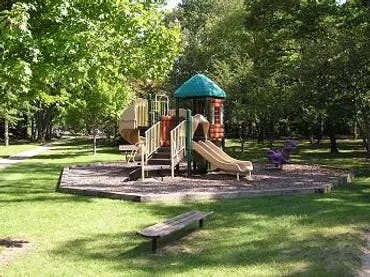 Playground with slides and climbing structures