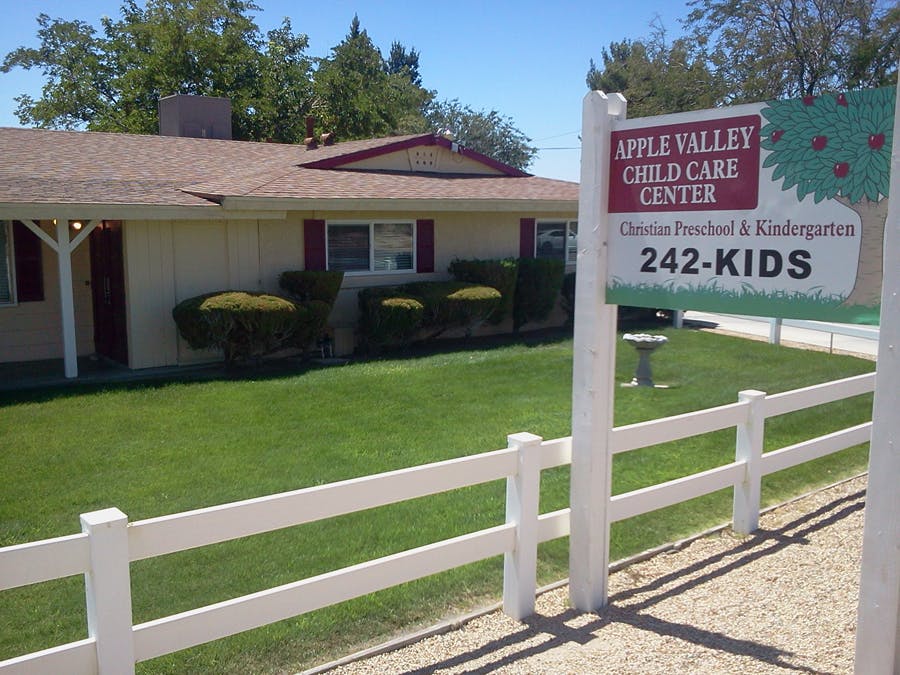 Apple Valley Child Care Center sign in front of a building