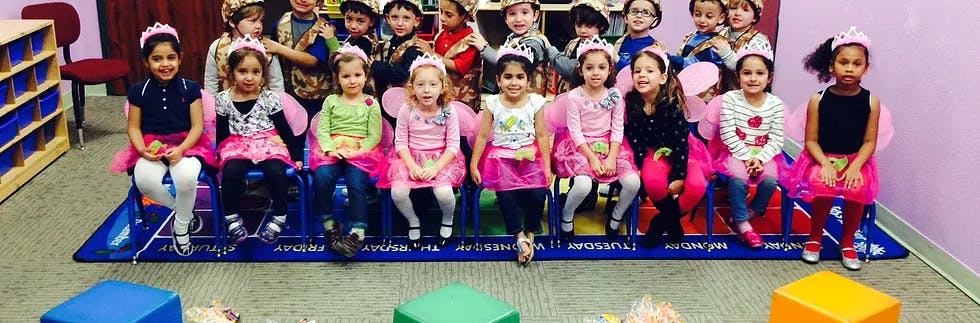 Group of children sitting in a classroom