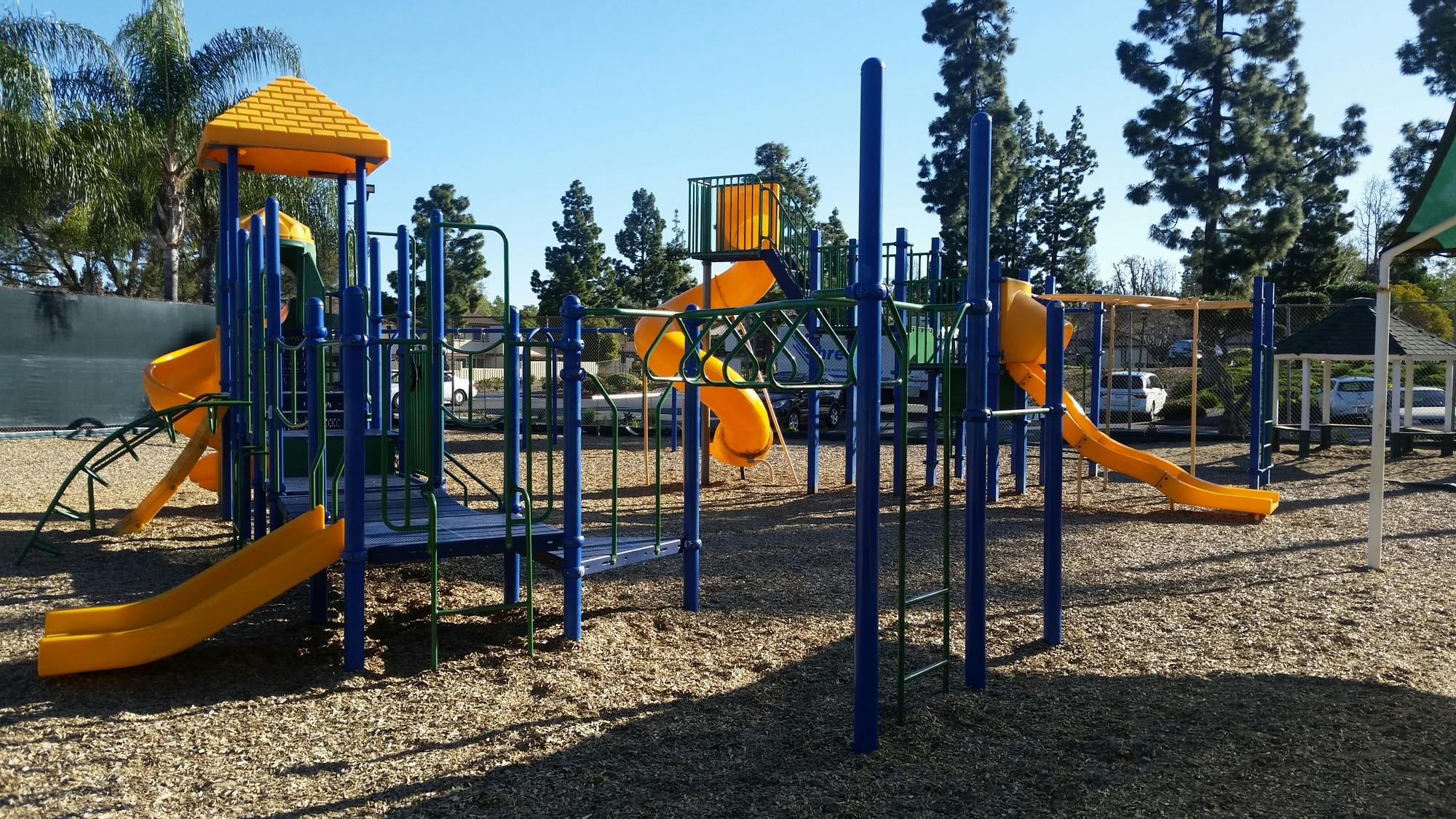 Empty playground with slides and climbing structures