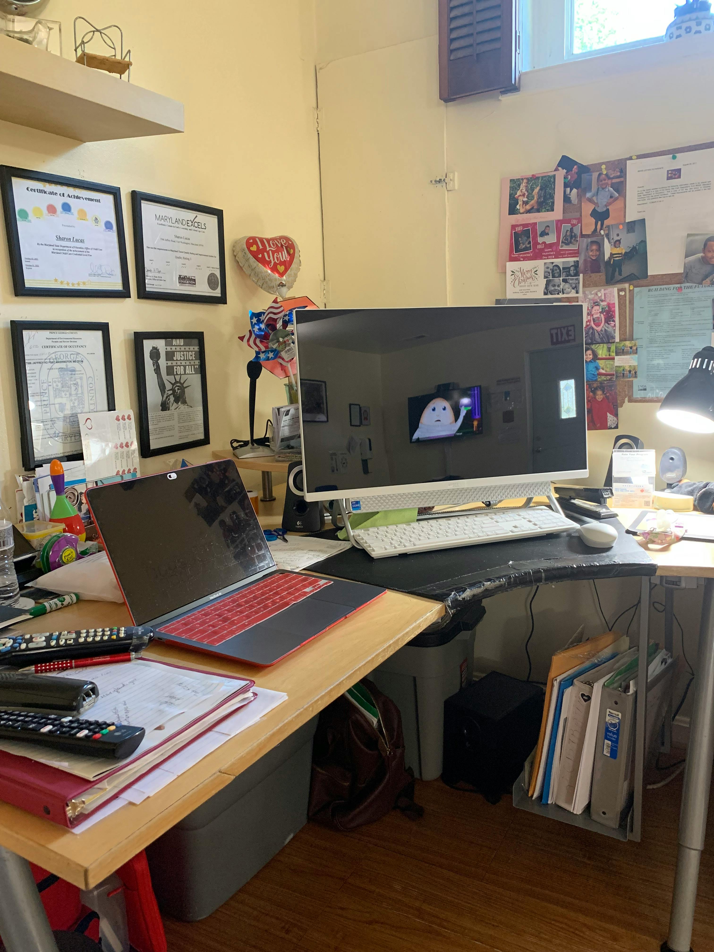 Laptop and desktop computer on a desk