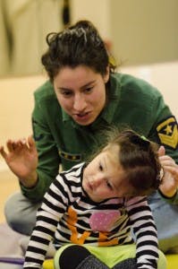 Adult and child interacting