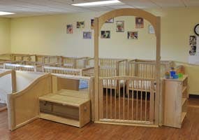 Empty cribs in a room