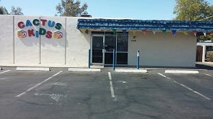 Building with a sign that says Cactus Kids