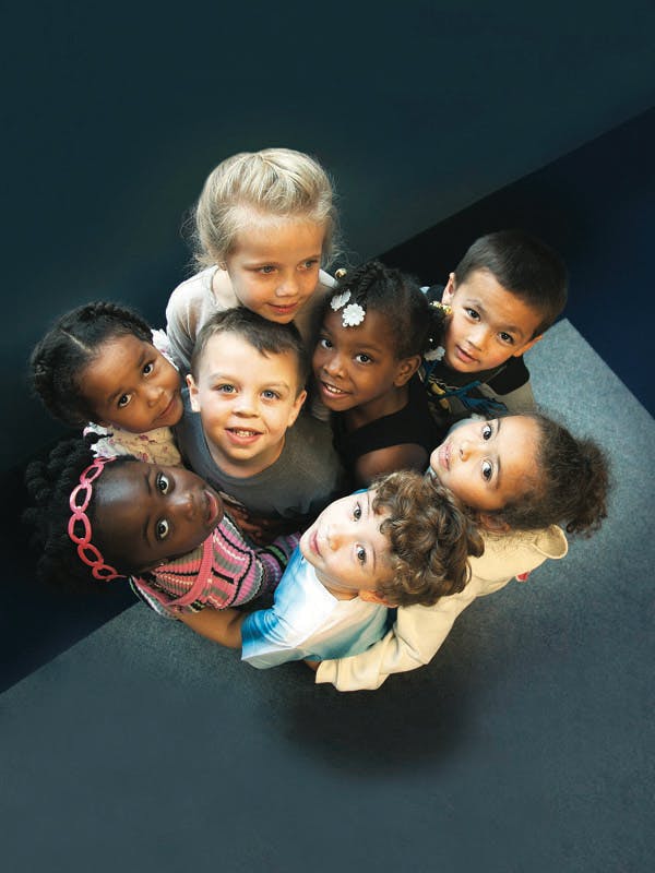 Group of children looking up at the camera